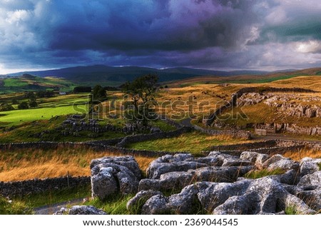 A beautiful view out over the WInskill Stones near Settle in the Yorkshire Dales National park Royalty-Free Stock Photo #2369044545