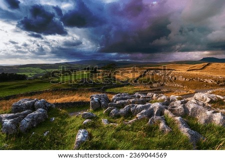 Stunning scenery and dramatic skies at the Winskill Stones at Stainforth in the Yorkshire Dales Royalty-Free Stock Photo #2369044569