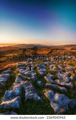 A limestone pavement at the Winskill Stones near Settle in the Yorkshire Dales Royalty-Free Stock Photo #2369045965