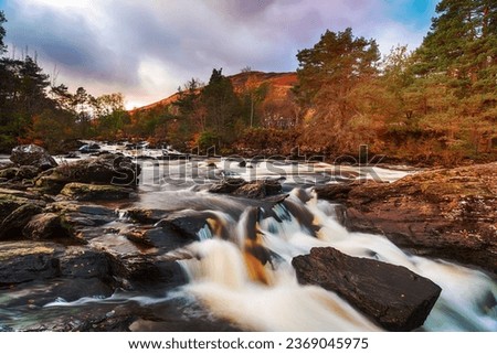 The Falls of Dochart at Killin on the western edge of Loch Tay in the Loch Lomond  The Trossachs National Park Royalty-Free Stock Photo #2369045975