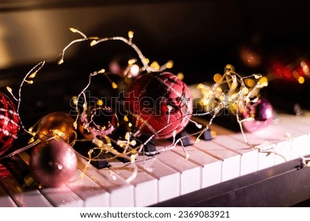Piano keys with Christmas decorations, closeup happy new year