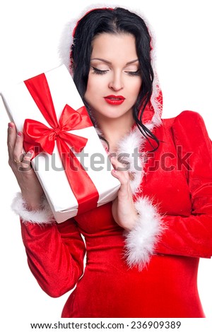 christmas, x-mas, winter, happiness concept - smiling woman in santa helper hat with many gift boxes. picture of cheerful santa helper girl with gift box
