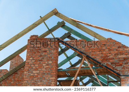 Construction of a modern house. Roofing works.