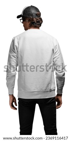Man wearing blank white sweatshirt and empty baseball cap standing isolated on white background. Sweatshirt or hoodie for mock up, logo designs or design print with with free space.