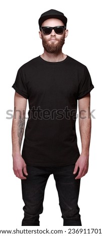 Hipster handsome male model with beard wearing black blank t-shirt with space for your logo or design isolated on white background