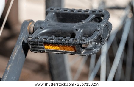 close up of a black bike pedal