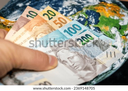 Brazilian money, reais banknotes, global economy, financial and economic concept