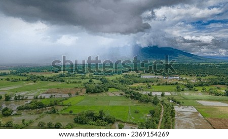 rain.Bird's eye view of rain.Picture of rain falling near the mountains.Rain near the mountains