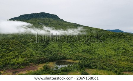 mountain above the clouds.Mountains above the clouds, the sun is rising.high angle mountain picture.wide angle mountain shot