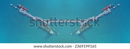 Aerial view of modern sea harbor with transshipment equipment for oil tanker ship, gas offshore platforms, Business transportation import export oil at gas petrochemical industrial factory Royalty-Free Stock Photo #2369199165