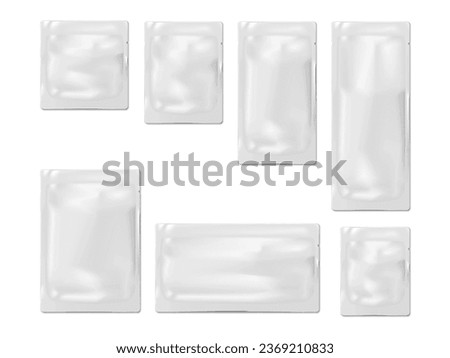 Blank white sachet packet with tear notches. Vector mock-up set. Plastic, paper or foil pouch bag template. Food, medical or cosmetic product individual package kit mockup Royalty-Free Stock Photo #2369210833