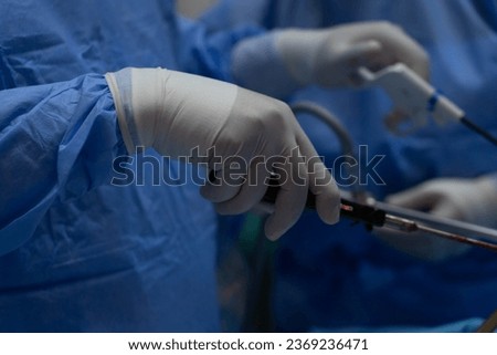 doctor performing surgery, laparoscopic sleeve surgery, selective focus Royalty-Free Stock Photo #2369236471