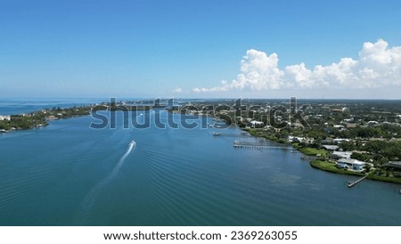 Aerial Shot Over Water Large Houses on the Ocean in Sarasota Florida
