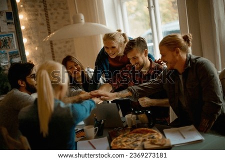 Young and diverse group of people studying together at home Royalty-Free Stock Photo #2369273181