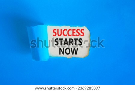 Success starts now symbol. Concept word Success starts now on beautiful white paper. Beautiful blue table blue background. Business motivational success starts now concept. Copy space.