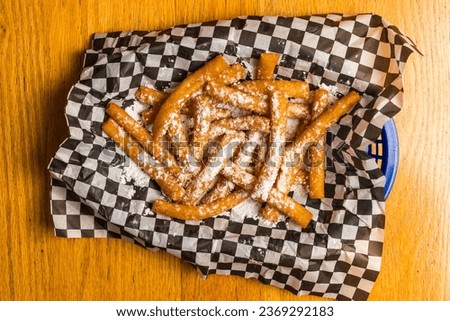Funnel cake fries in a basket