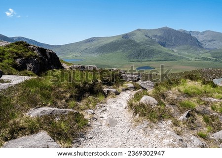 Views from the remote Conor Pass on the Dingle Peninsula on the Wild Atlantic Way in Country Kerry Ireland.  Shot bear loughdoon, peddlers lake,  clogharee, cloughane.   Royalty-Free Stock Photo #2369302947