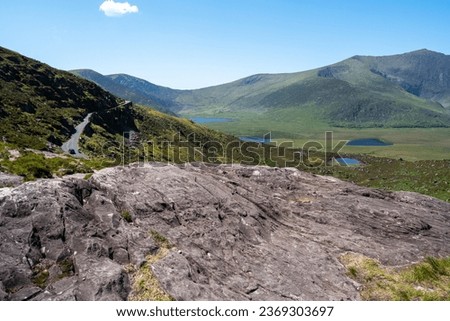 Views from the remote Conor Pass on the Dingle Peninsula on the Wild Atlantic Way in Country Kerry Ireland.  Shot bear loughdoon, peddlers lake,  clogharee, cloughane.   Royalty-Free Stock Photo #2369303697
