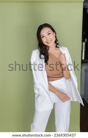 Beautiful asian woman expert businesswoman wearing a jacket indoor outdoor confident 