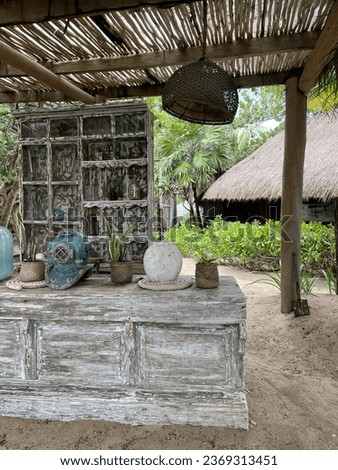 Cozy hygge place for weekend relax in a beach garden in a boho style. Concept of rest outdoor. Cozy exterior beach backyard.