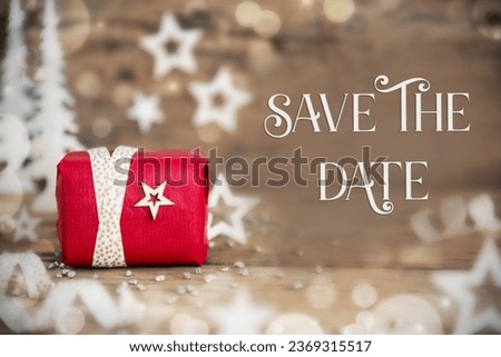 Text Save The Date, With Christmas Gift, Wooden Background, Stars, Winter or Christmas Decoration