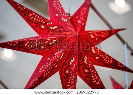 A red illuminated poinsettia with many details and very high quality