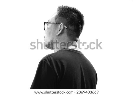 Middle-aged man leaning sideways on a white background