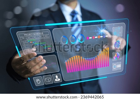 Digital marketing business data visualization concept. Businessman with ai assistance analytic digital virtual screen for KPI market strategy and revenue target on total summary sale information