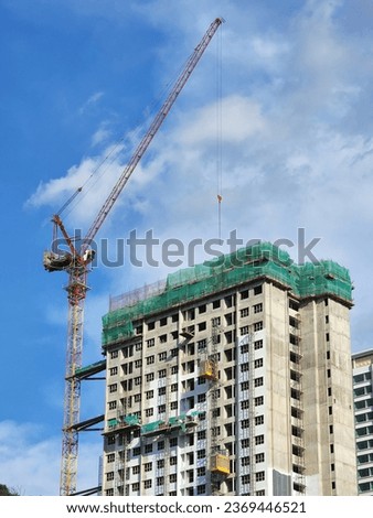 "TRUST THE PROCESS". If you want to succeed in something, you must go through a process. It's the same as building a building. The picture shows the process of building a building with a crane lifting