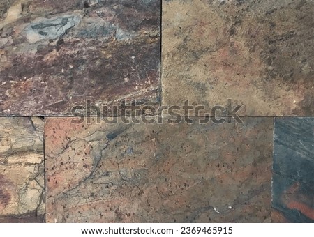 Rustic acid slate tiles, honed and colorized as copper and natural brown color, with uneven texture. Natural rustic slate tiles seamless texture.