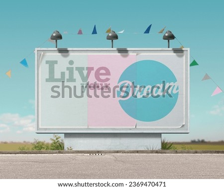 Inspirational and motivational advertisement on large vintage style billboard: live your dreams