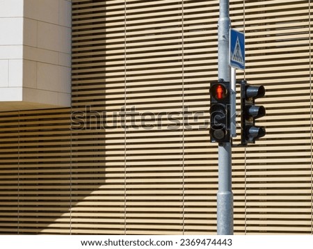 traffic light, urban detail with architectural detail background
