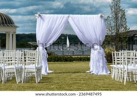 marriage ceremony white arch. wedding ceremony