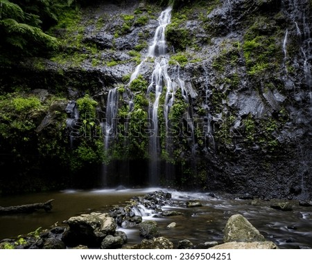 Small Waterfall in deep forest. Shoot with slow shutter speed or long exposure