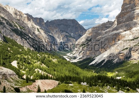 Valley Val Travenanzes and path way rock face in Tofane gruppe, Alps Dolomites mountains, Fanes national park, Italy Royalty-Free Stock Photo #2369523045