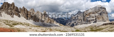 Valley Val Travenanzes and rock face in Tofane gruppe, Mount Tofana de Rozes, Alps Dolomites mountains, Fanes national park, Italy Royalty-Free Stock Photo #2369531131