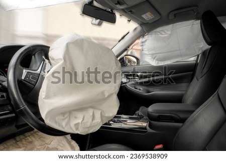 Airbag ruptured in an accident Royalty-Free Stock Photo #2369538909