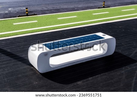 smart bench with solar panels on the bike path, Sibiu city, Romania Royalty-Free Stock Photo #2369551751