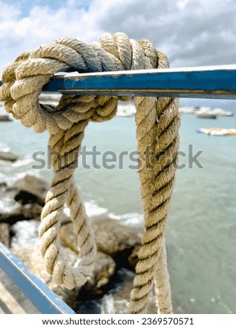 marine knots to keep the boat still Royalty-Free Stock Photo #2369570571