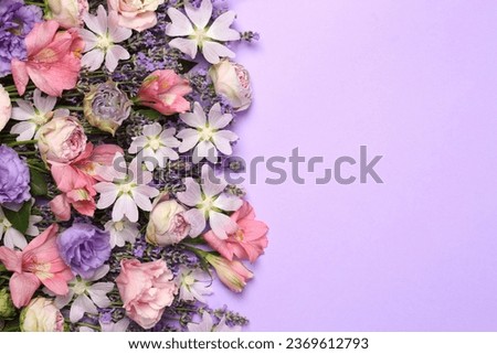 Flat lay composition with different beautiful flowers on violet background, space for text