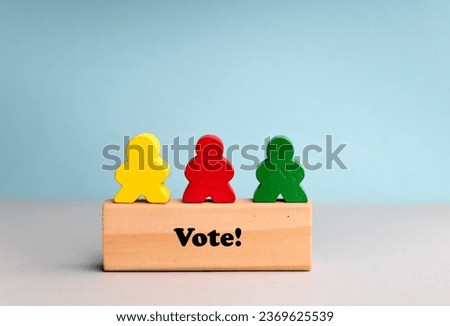 Vote  word on wooden blocks .The concept of voting, making choices. 