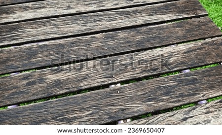 Old wooden bridge floor Over time, strange and beautiful patterns have emerged. vintage abstract background