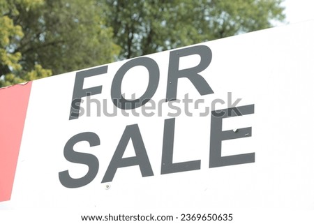 for sale writing caption text words sign with tree behind in black on white background with red on left