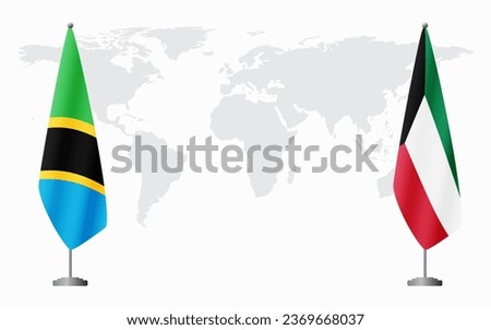 Tanzania and Kuwait flags for official meeting against background of world map.