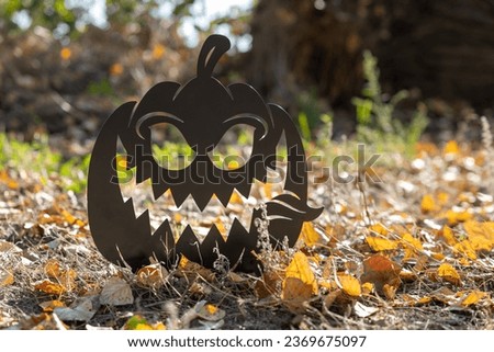 Halloween background concept. Jack O, pumpkin, angry face shadow. Creepy smiling shadow of orange jack-o'-lantern, Halloween party design