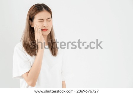 Asian woman feel toothache from gingivitis, female suffer tooth, decay problems, dental care. sensitive tooth, decay problem, bad breath, Gingival Recession, Oral Hygiene instruction, tooth extraction Royalty-Free Stock Photo #2369676727
