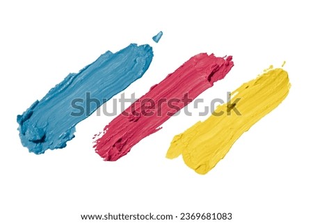 Blue, red and yellow paint brush strokes on white background with clipping path