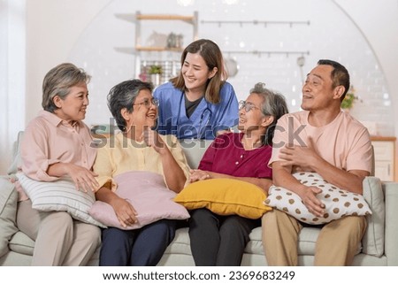 Portrait happy elderly people, doctor talking together, consulting mental health, smiling with happiness, sitting in indoor nursing home, community. Retirement, Healthcare Concept
