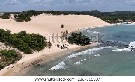 Caribbean scenery at Genipabu Beach in Rio Grande do Norte. Brazil Northeast. Vacations landscape. Paradise scenery. Genipabu Beach at Rio Grande do Norte. Scenic beach at Brazil Northeast.