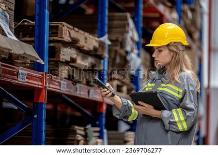 woman worker walking and checking stock items for shipping. Female inspecting the store factory. Logistics employees holding folders at on site warehouse area for shipping transportation.